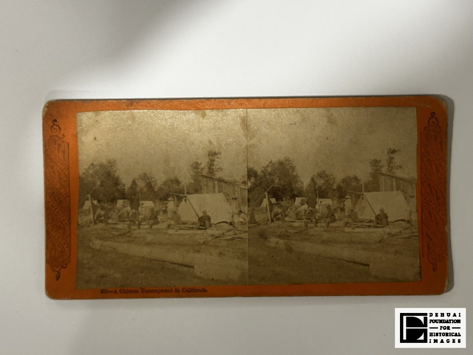 TFA-CA-115 — Mount face with printed decorative borders and caption 631.
